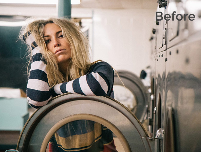 woman sad with washing machine